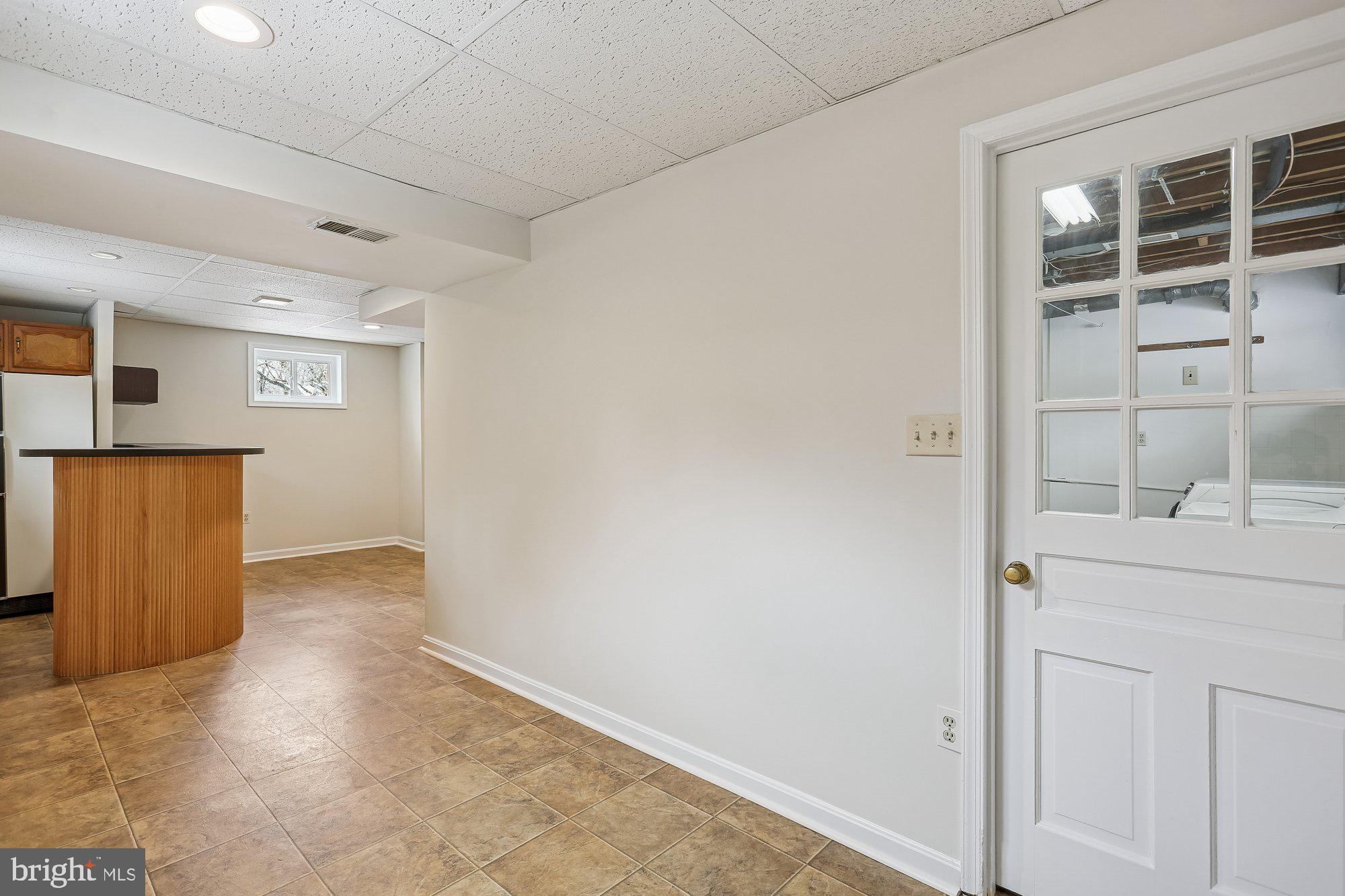 513 Beaumont Road Silver Spring, MD 20904 - Photo 34 of 58 Bar Area. Utility Room Door