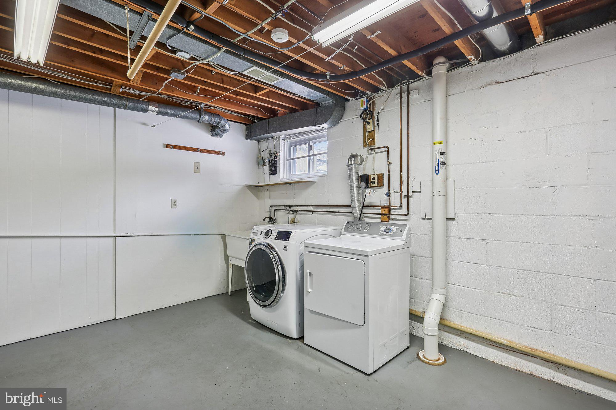 513 Beaumont Road Silver Spring, MD 20904 - Photo 35 of 58 Utility. GE Washer, 2023. Radon Reduction System