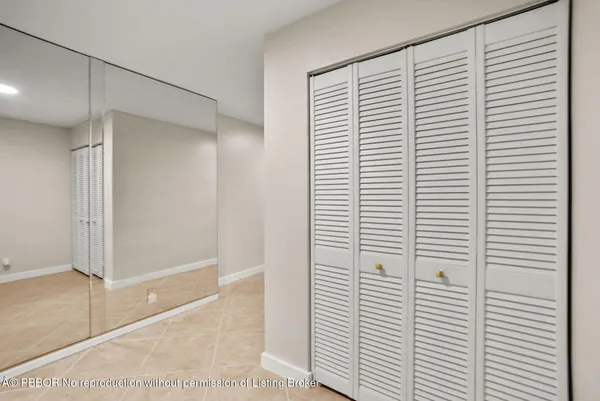 a view of a room with a white door