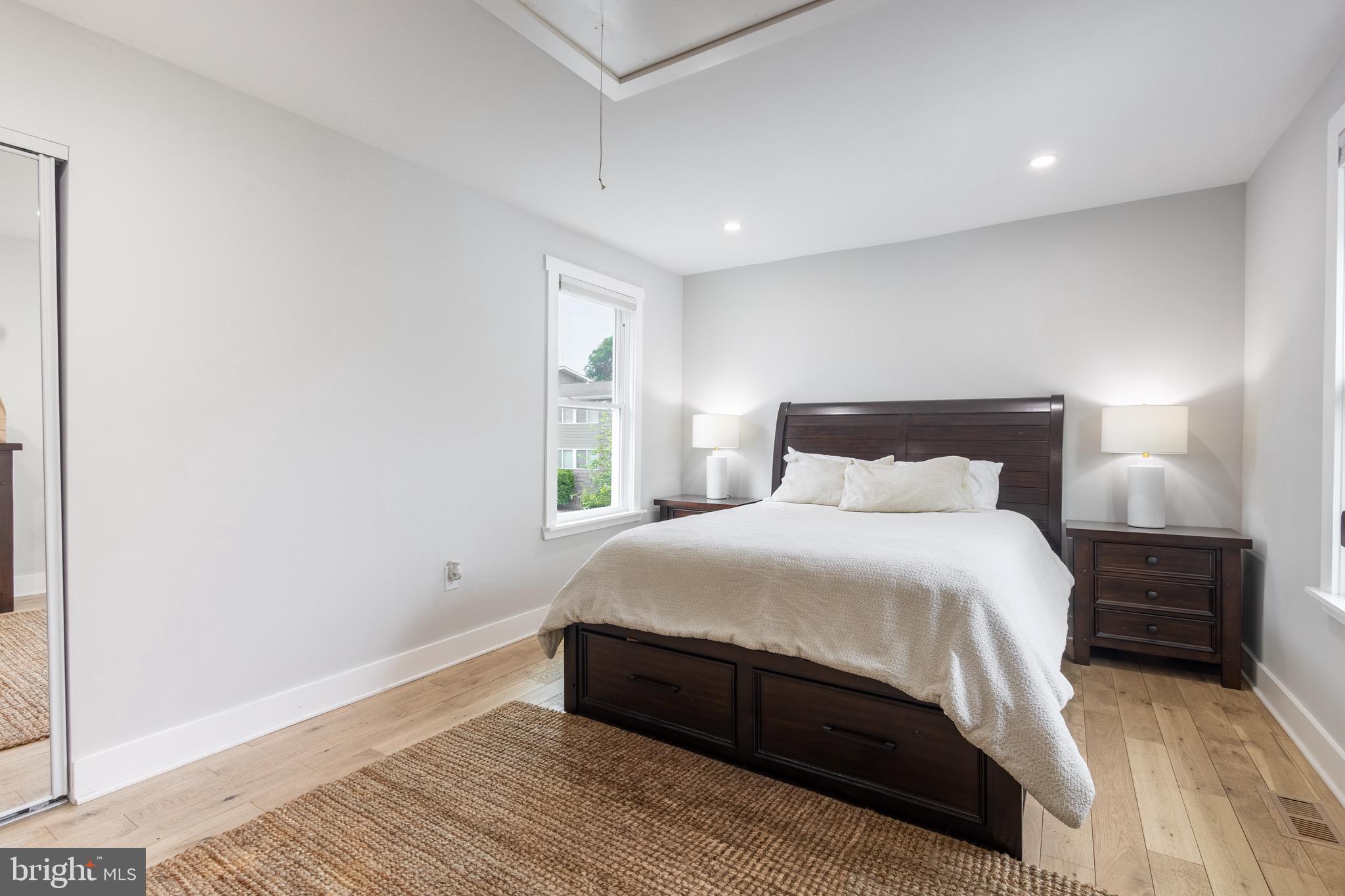 37 4th Street Laurel, MD 20707 - Photo 16 of 26 a bedroom with a bed and a window