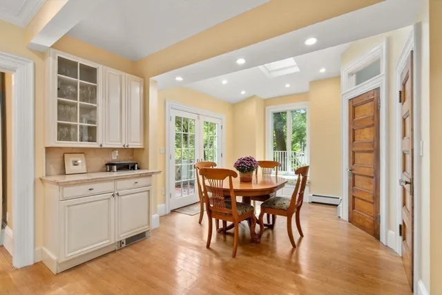 a view of a dining room with furniture window and outside view