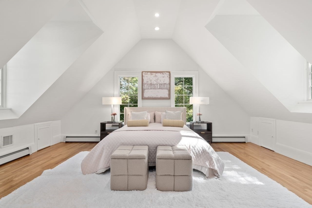 1430 Beacon Street Newton, MA 02468 - Photo 17 of 38 a bedroom with a bed and a night stand