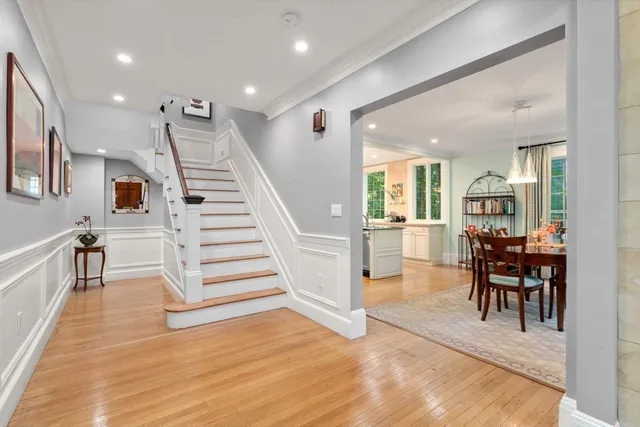 a view of dining room with furniture and wooden floor