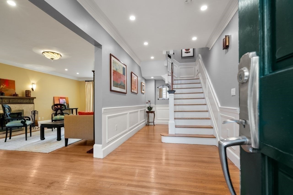 1430 Beacon Street Newton, MA 02468 - Photo 3 of 38 a view of entryway and dining room with furniture