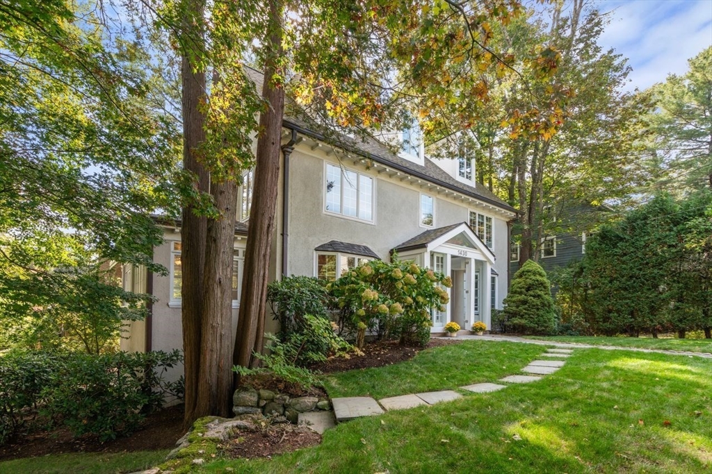 1430 Beacon Street Newton, MA 02468 - Photo 32 of 38 a front view of a house with garden