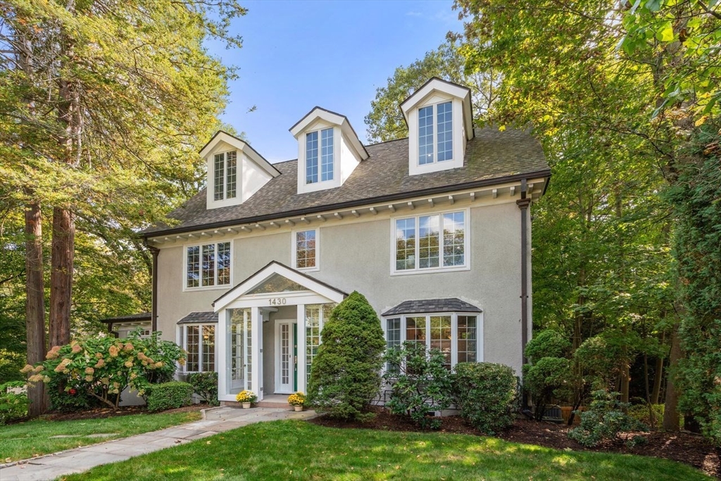 1430 Beacon Street Newton, MA 02468 - Photo 35 of 38 front view of a house with a yard