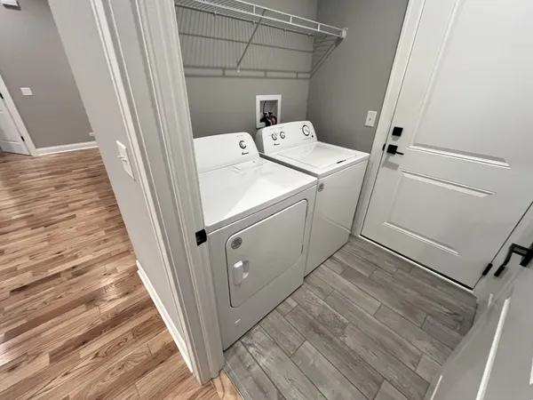 a utility room with dryer and washer