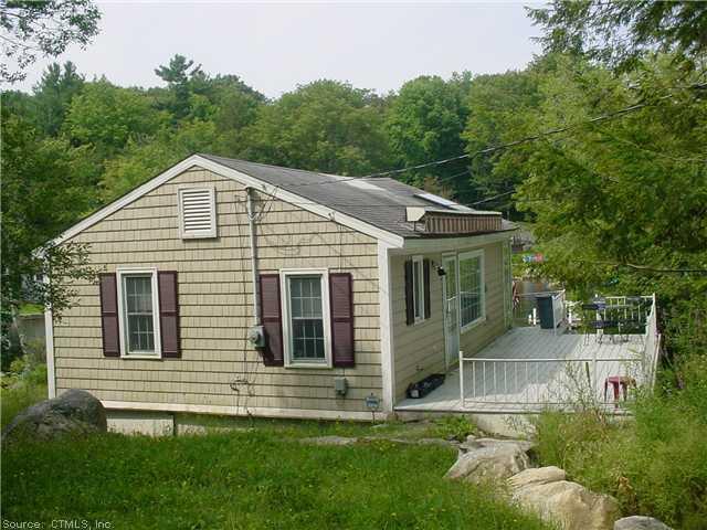 154 Sandy Beach Road Goshen, CT 06756 - Photo 1 of 1 a front view of a house with a yard