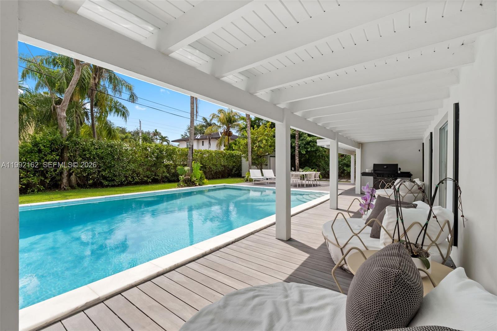 7531 Southwest 52nd Court Miami, FL 33143 - Photo 2 of 56 a view of a porch with furniture and garden