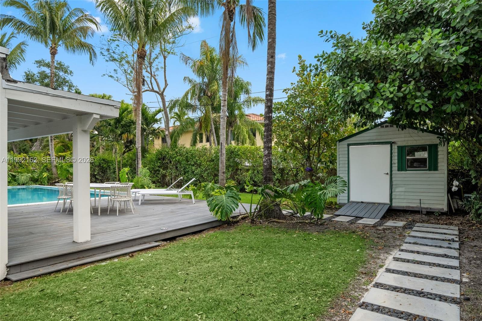 7531 Southwest 52nd Court Miami, FL 33143 - Photo 29 of 56 a view of a backyard with a garden