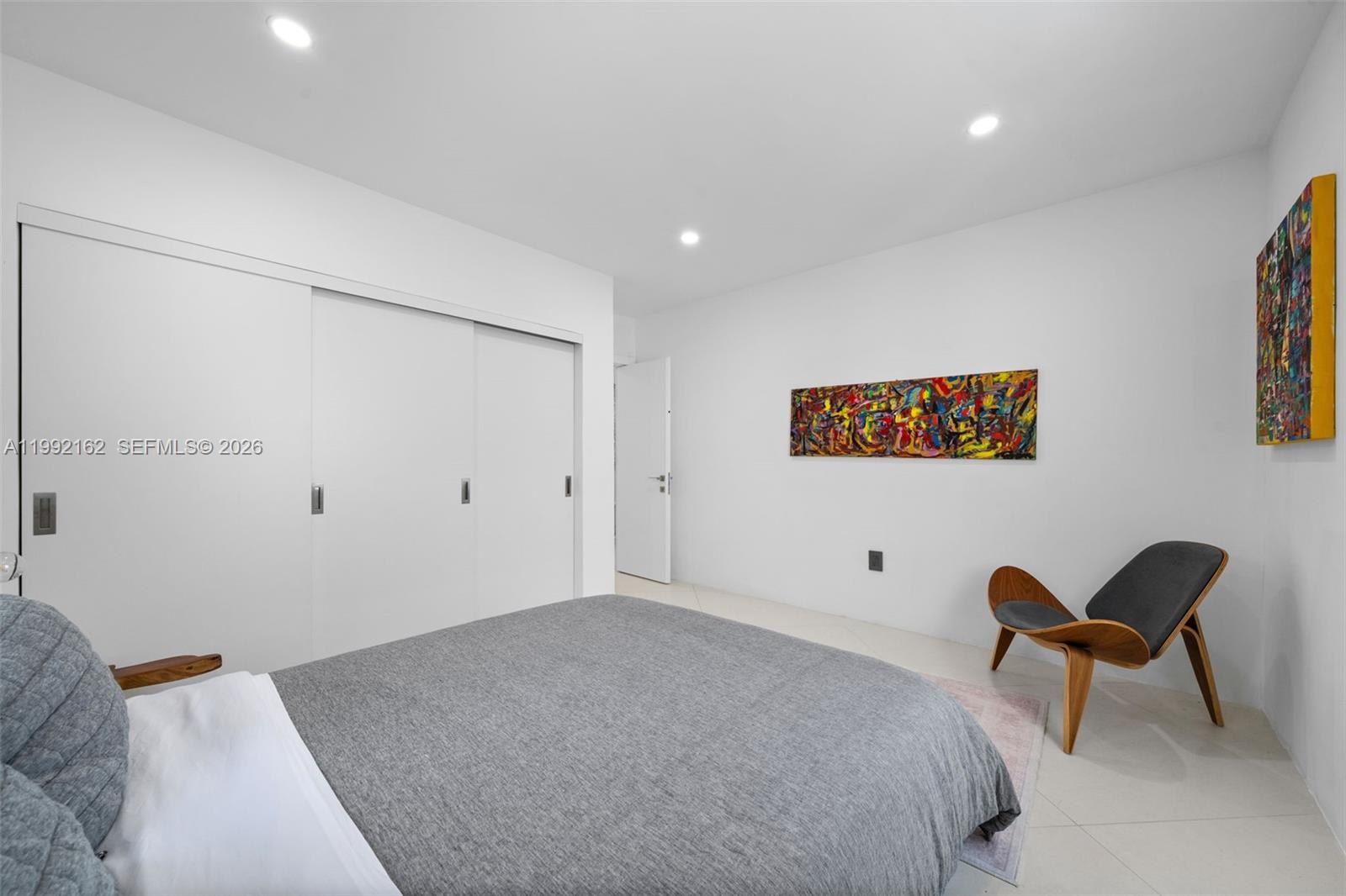 7531 Southwest 52nd Court Miami, FL 33143 - Photo 38 of 56 a bedroom with a bed and furniture