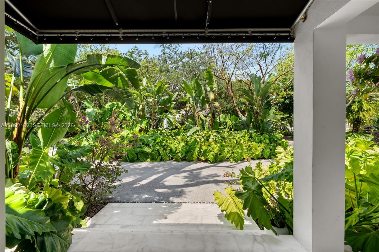 7531 Southwest 52nd Court Miami, FL 33143 - Photo 52 of 56 a view of green plant in a garden