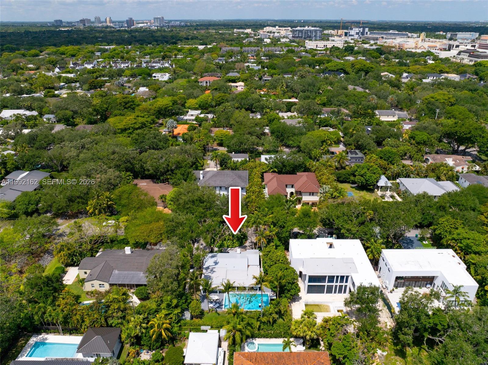 7531 Southwest 52nd Court Miami, FL 33143 - Photo 55 of 56 an aerial view of residential houses with outdoor space and trees
