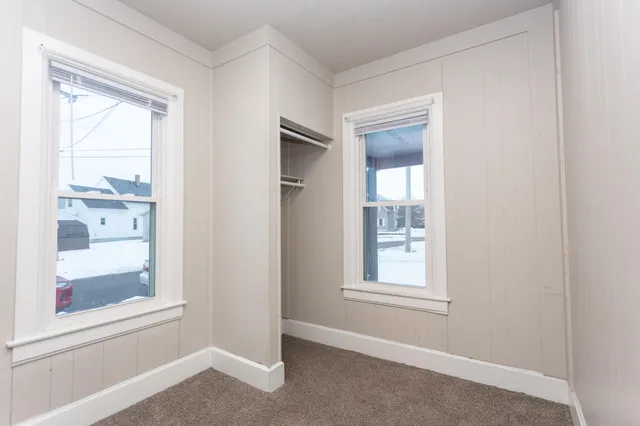 a view of an empty room and window