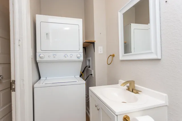a bathroom with a sink and a vanity