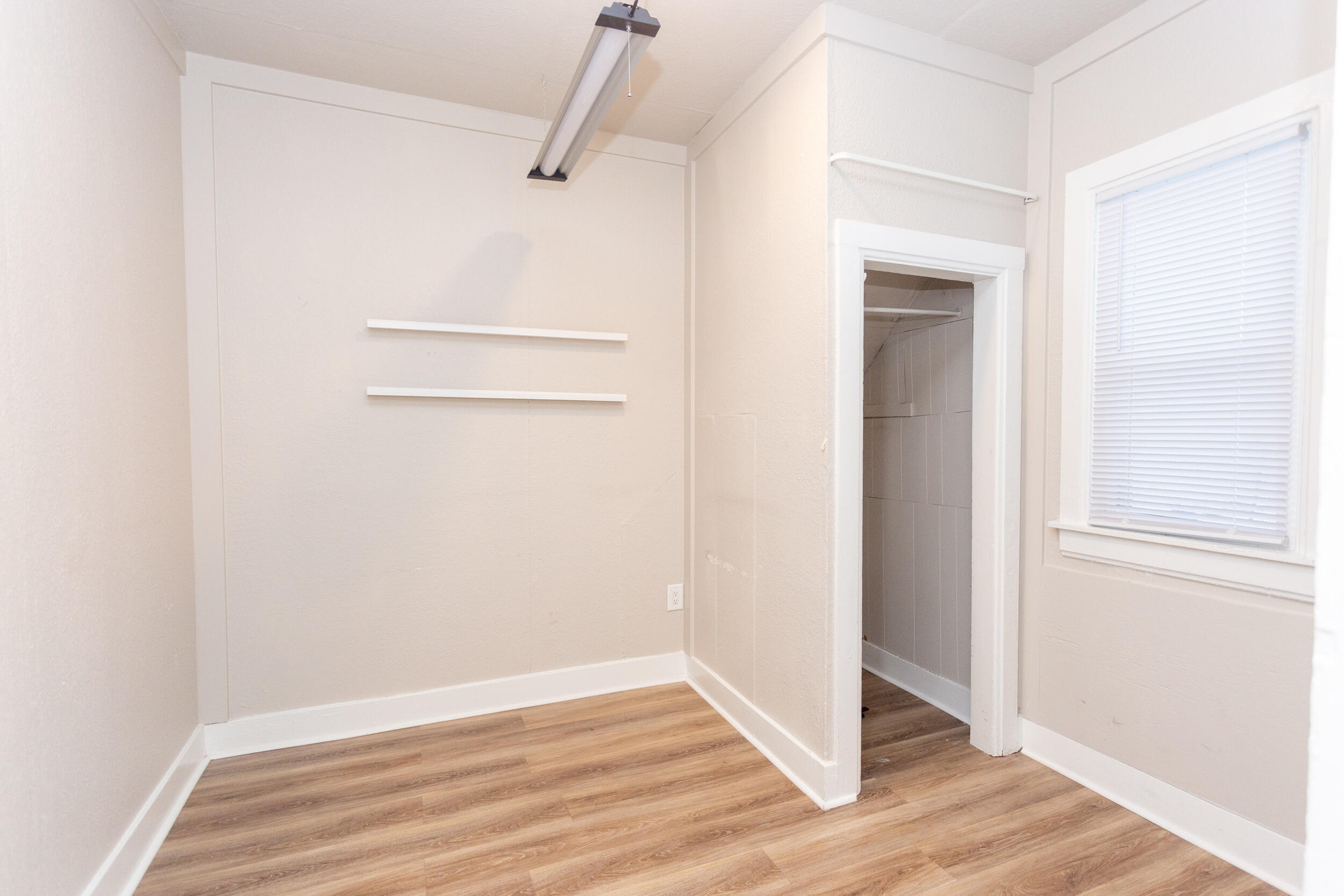 1602 Kentucky Street, Unit 1 Michigan City, IN 46360 - Photo 10 of 13 a view of a room with wooden floor