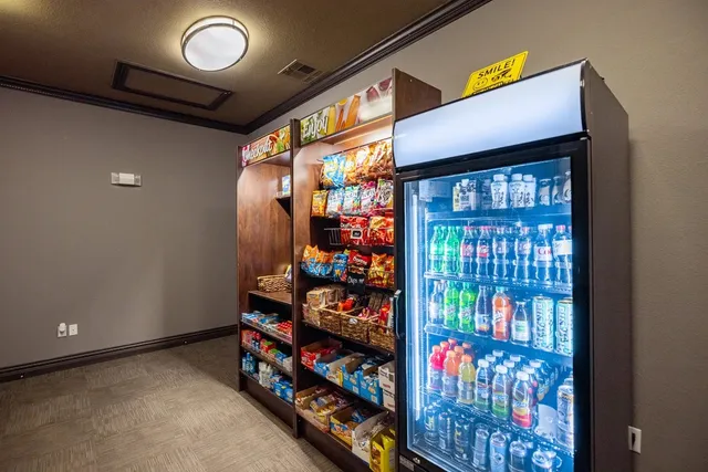 a store room with lots of fruit and vegetables