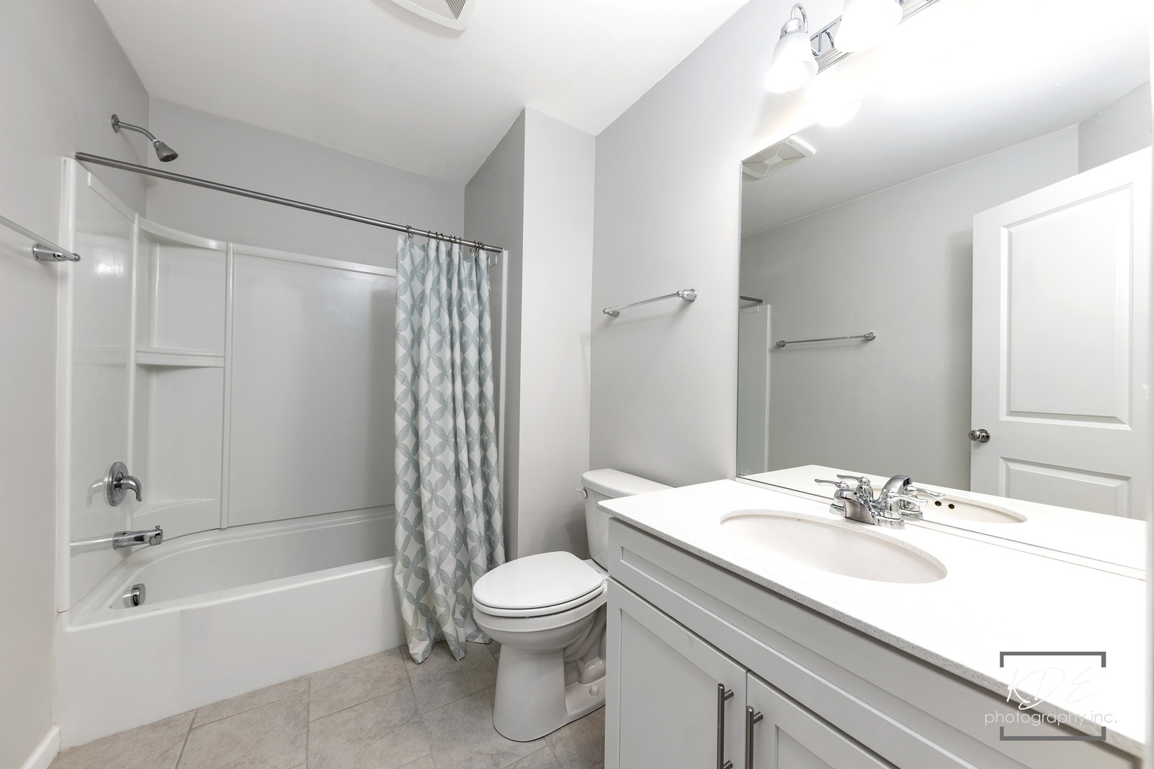 2110 Weatherbee Lane Naperville, IL 60563 - Photo 27 of 32 a bathroom with a sink a toilet and shower