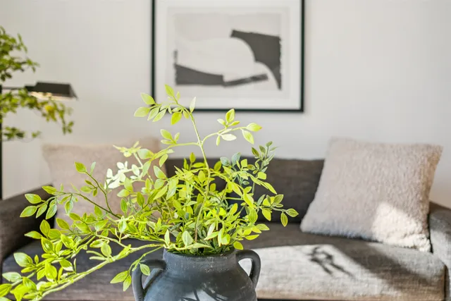 a vase of flowers sitting on a table