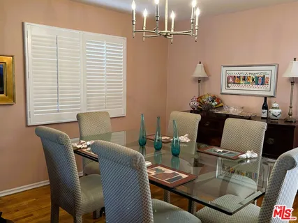 a view of a dining room with furniture