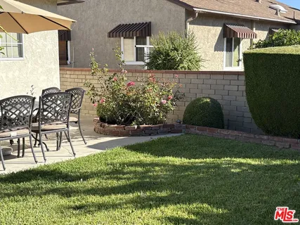 a outdoor view with a seating space