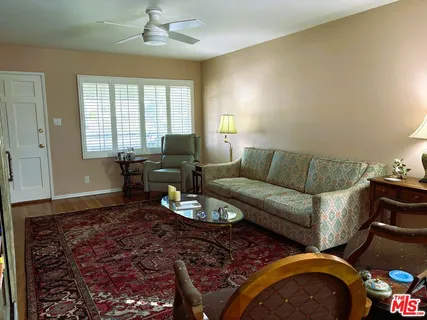 a workspace with furniture and wooden floor