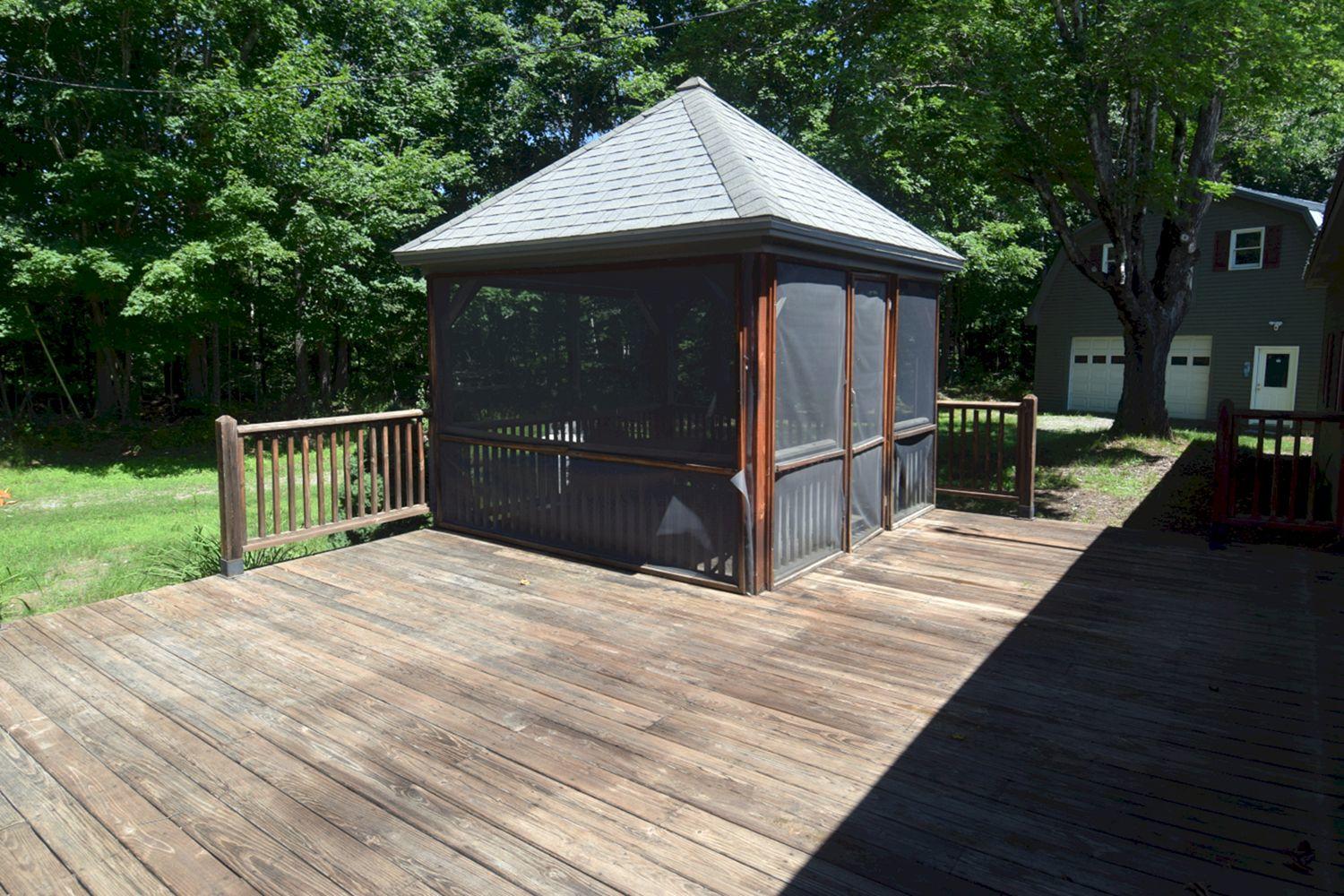 110 Patterson Bridge Road North Anson, ME 04958 - Photo 47 of 94 Deck with screened gazebo (2)