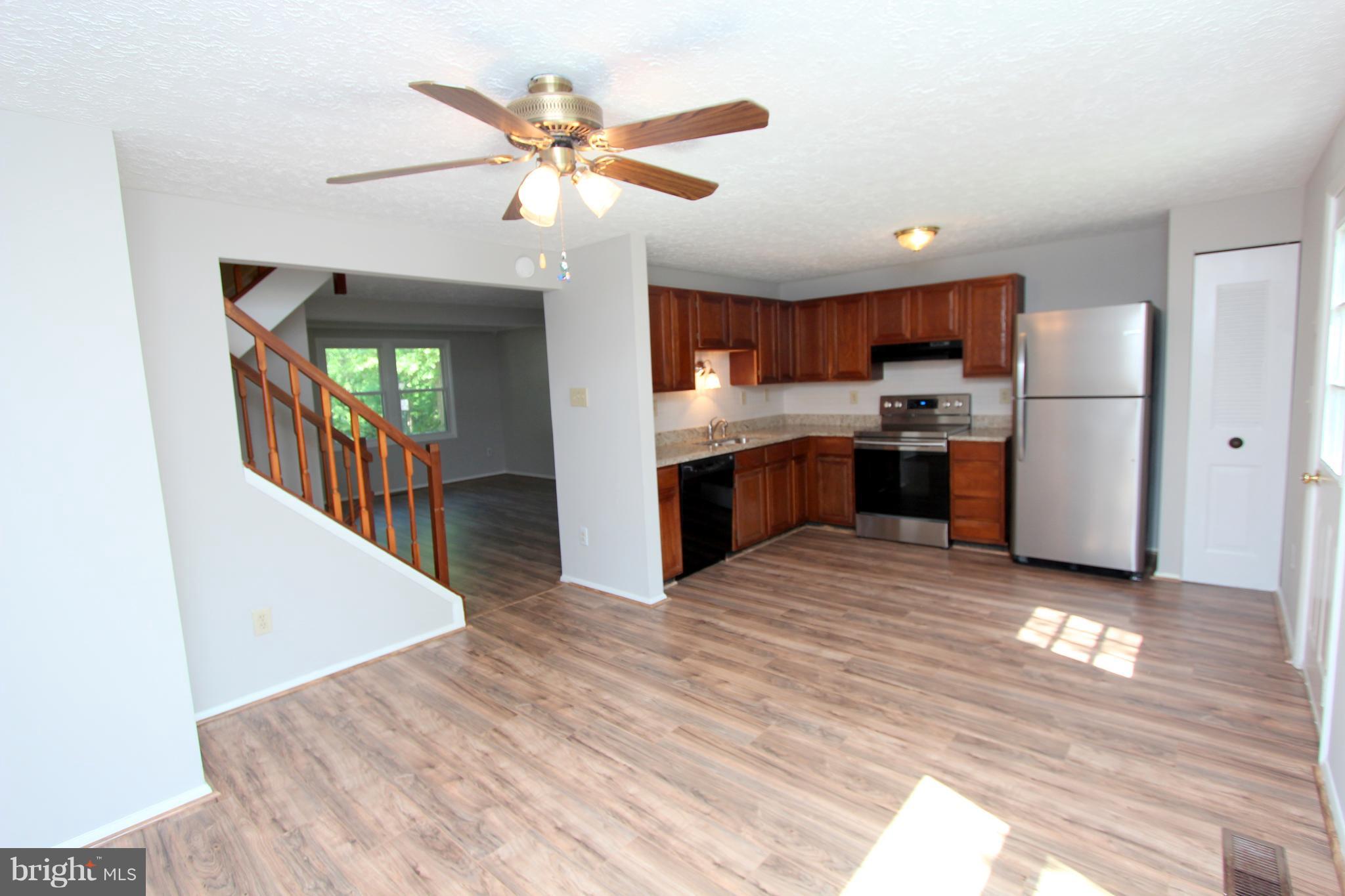 8757 Newington Commons Road Lorton, VA 22079 - Photo 6 of 20 Kitchen and dining area