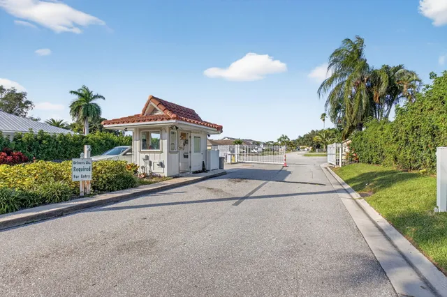 a view of house with outdoor space and garden