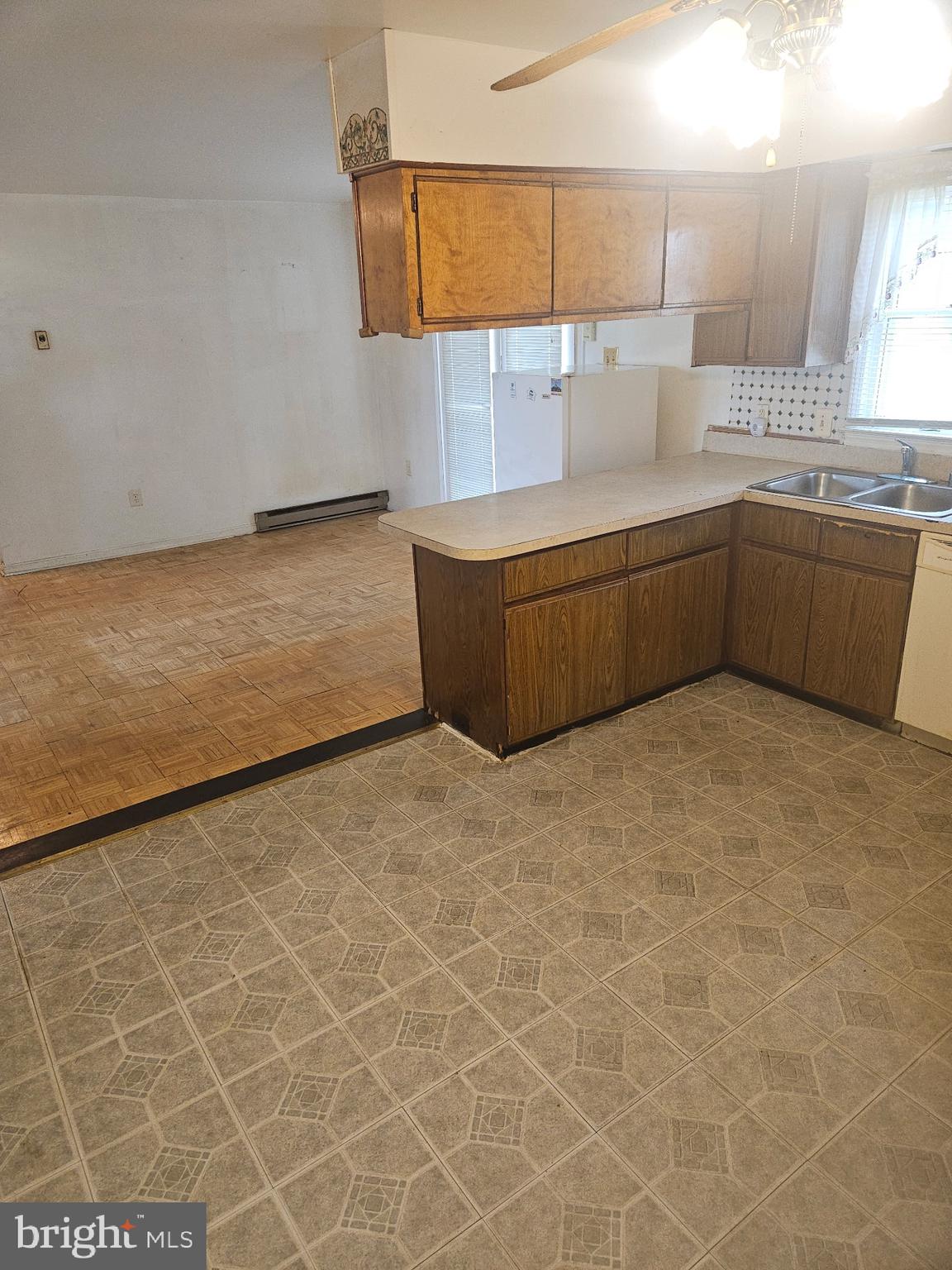 29982 Deal Island Road Princess Anne, MD 21853 - Photo 5 of 19 Kitchen into dining room