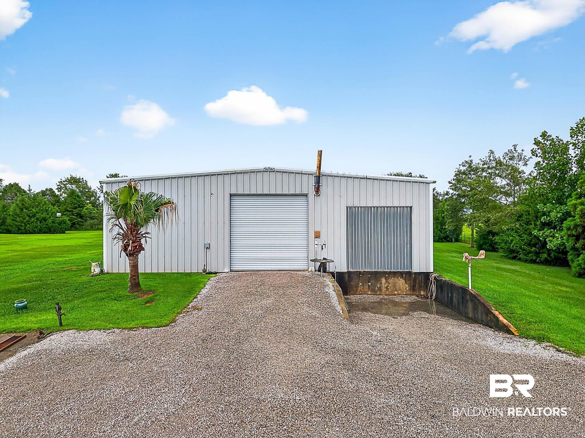 17270 Davis Road Summerdale, AL 36580 - Photo 66 of 97 Detached garage with driveway