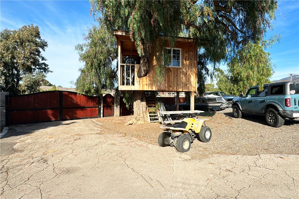 3502 Proctor Valley Road Bonita, CA 91902 - Photo 6 of 22 a view of a patio with a table and chairs under an umbrella