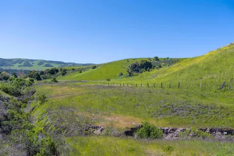 a view of a lake with a mountain in the background