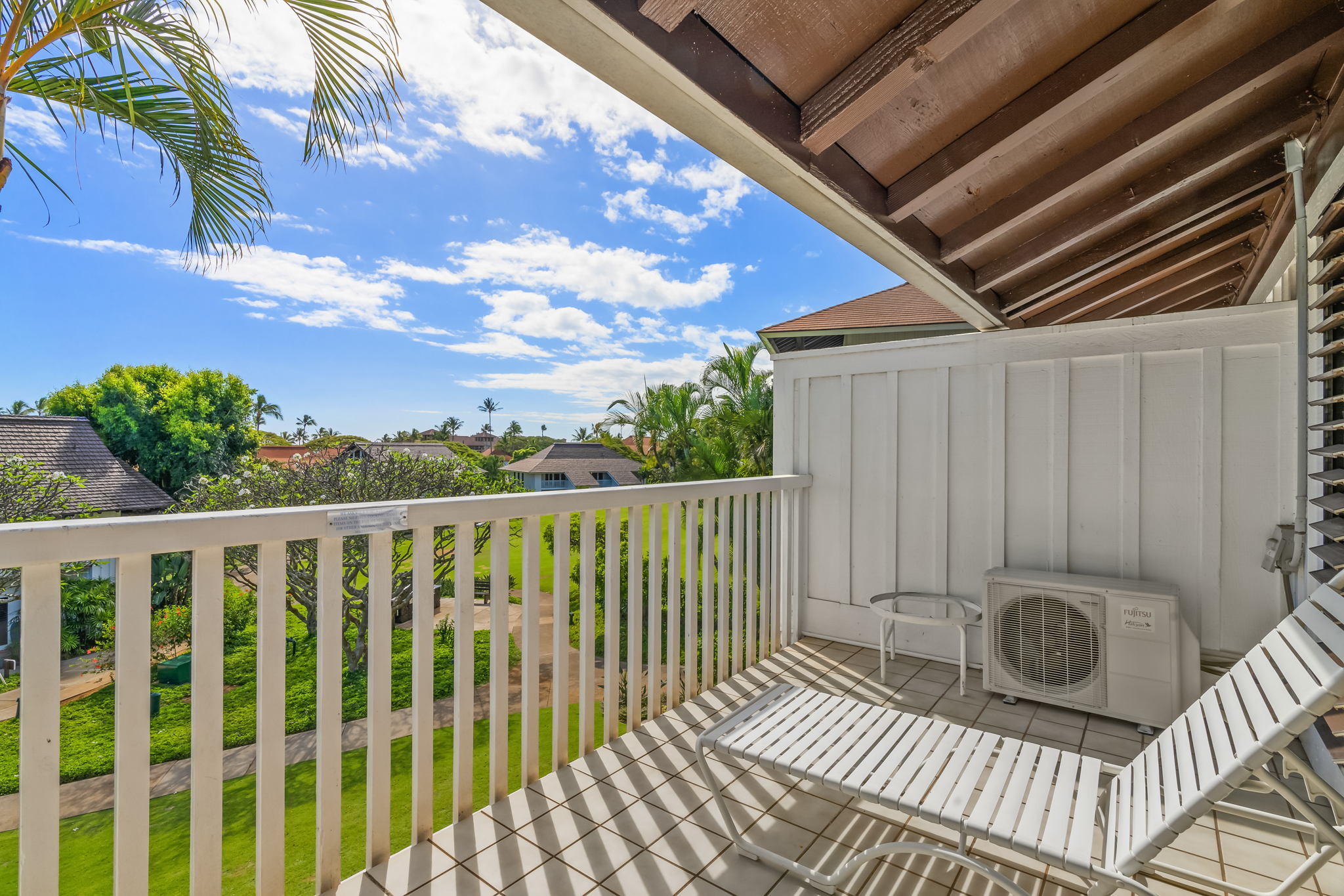 2253 Poipu Road, Unit 109 Koloa, HI 96756 - Photo 12 of 12 a view of a balcony with furniture