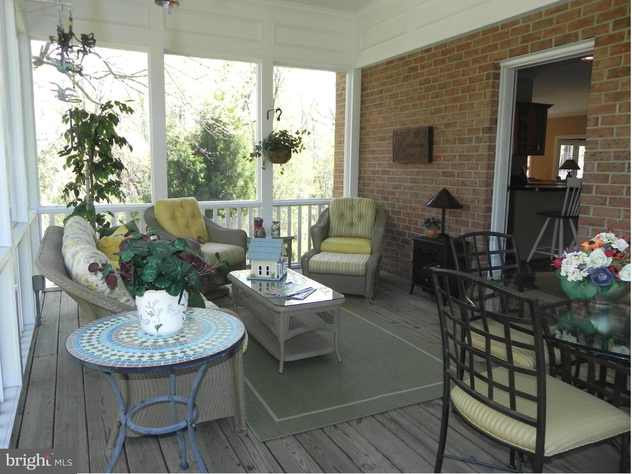 1230 Algonquin Road Crownsville, MD 21032 - Photo 20 of 30 Screened in porch w/ ceiling fan