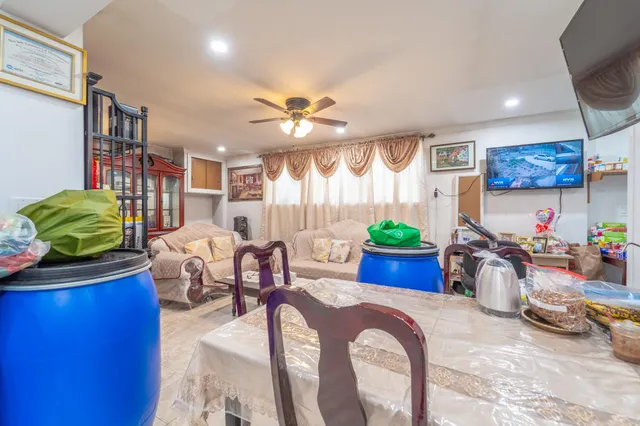 a living room with furniture fireplace and a flat screen tv