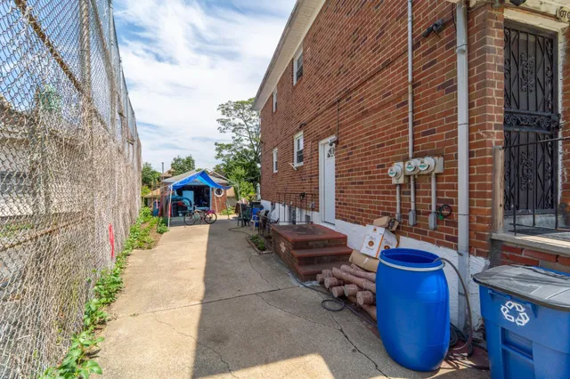 a view of a chairs and table in backyard
