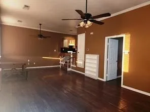 a view of a livingroom with a hardwood floor