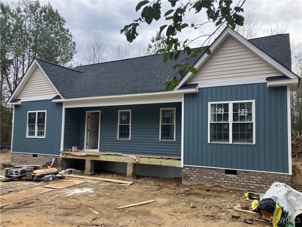 View of front of property featuring covered porch