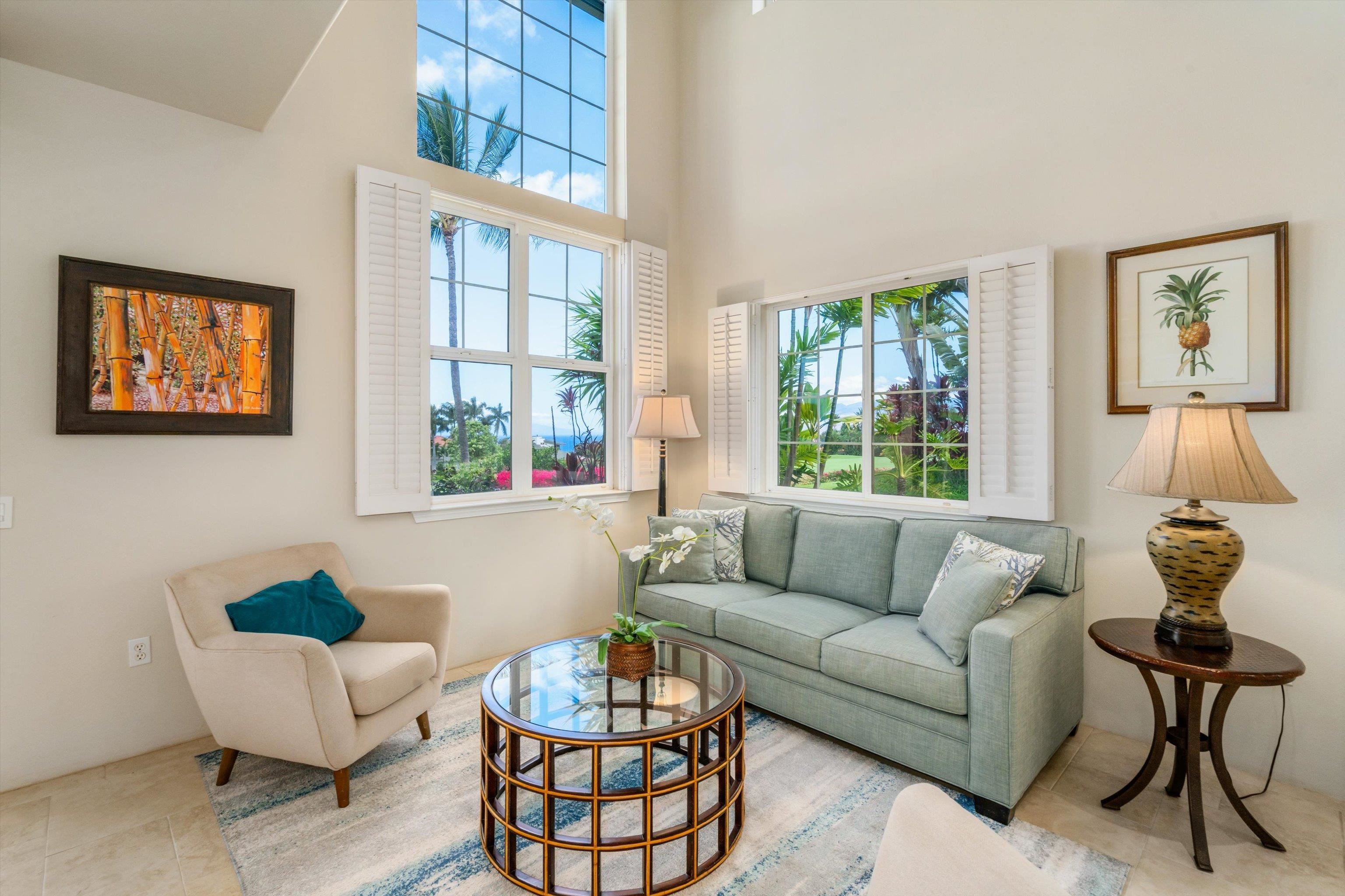 3950 Kalai Waa Street, Unit R 103 Kihei, HI 96753 - Photo 12 of 50 a living room with furniture and a window