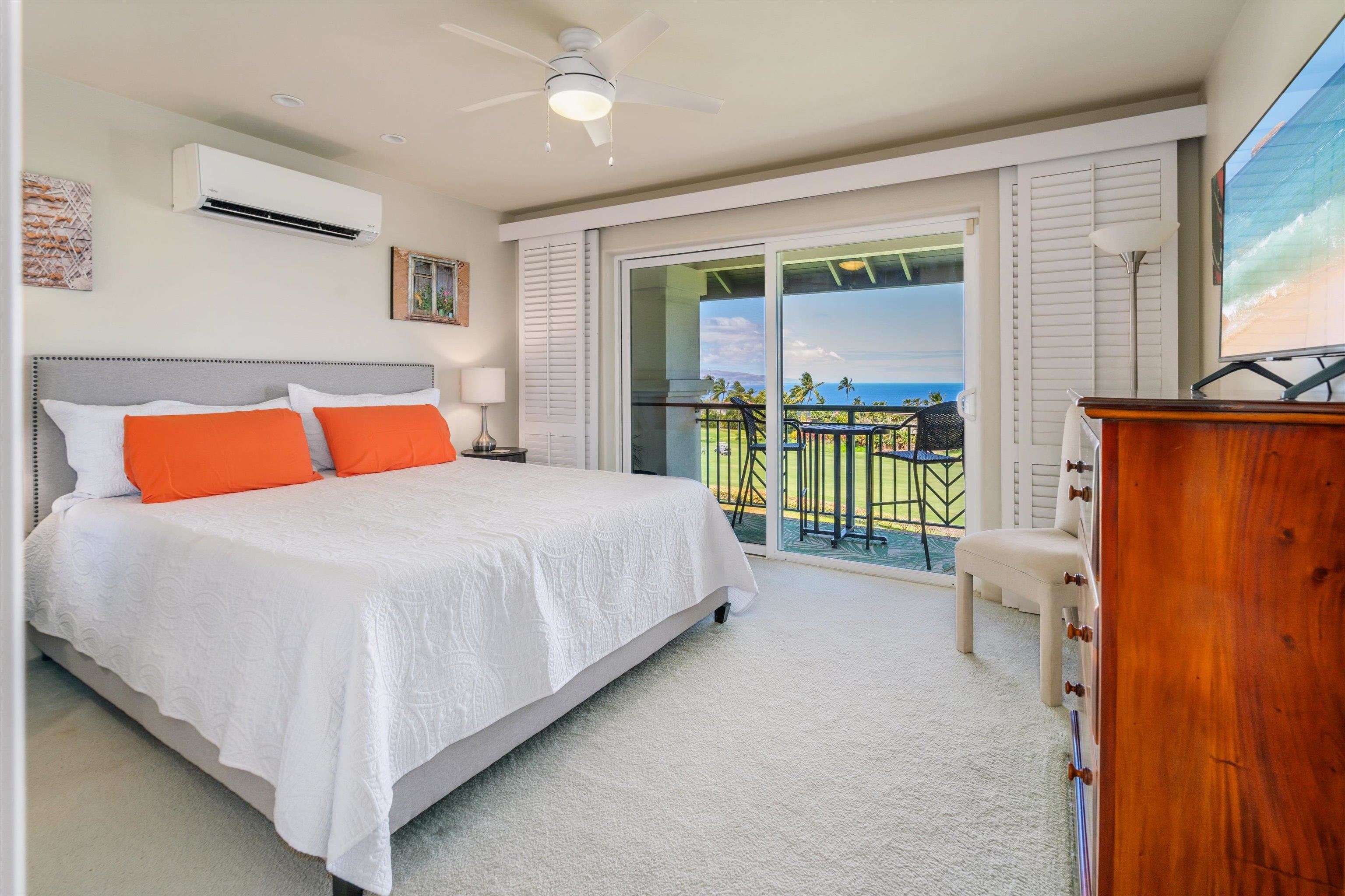 3950 Kalai Waa Street, Unit R 103 Kihei, HI 96753 - Photo 15 of 50 a bedroom with a bed and window