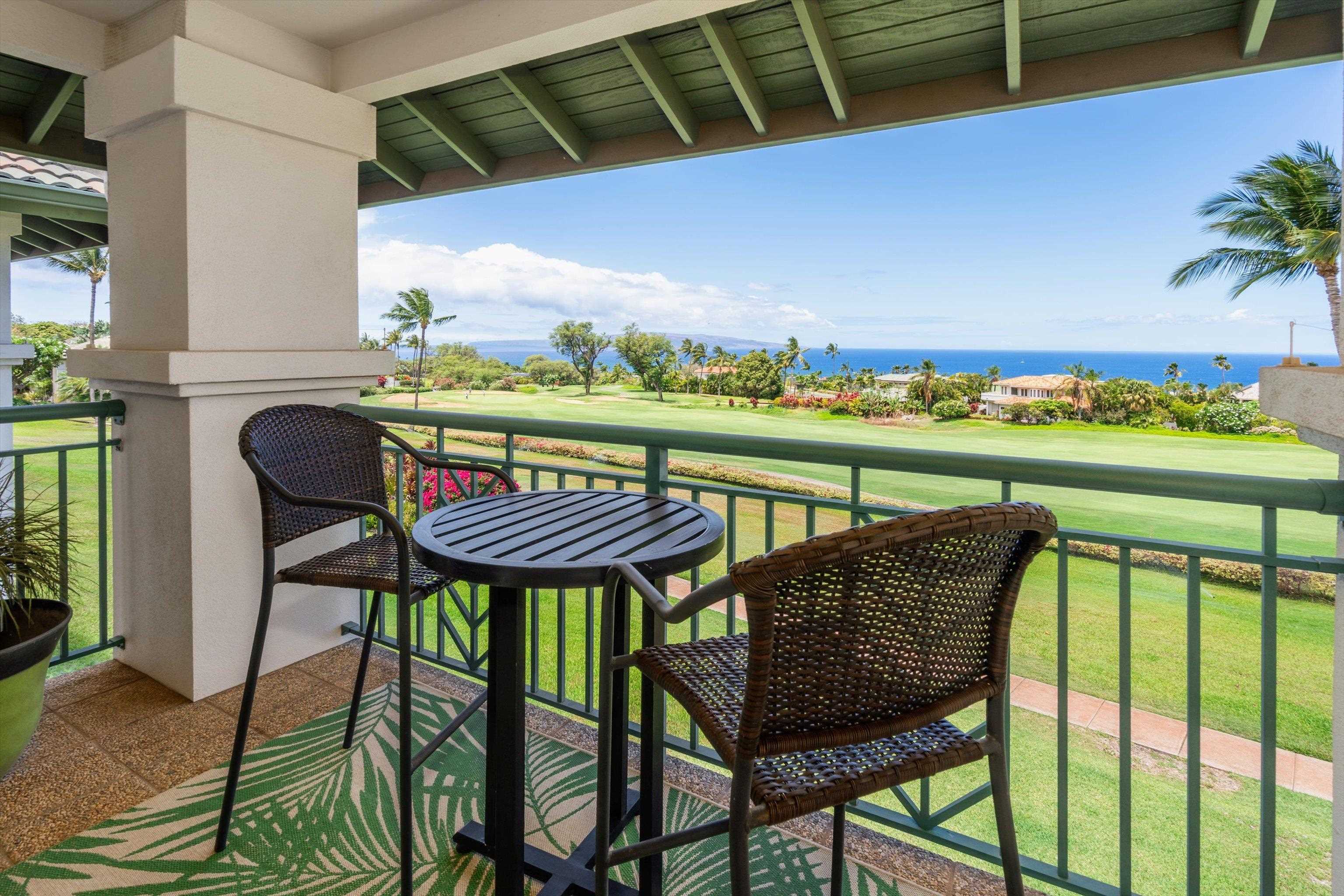 3950 Kalai Waa Street, Unit R 103 Kihei, HI 96753 - Photo 16 of 50 a view of a chairs and table in patio