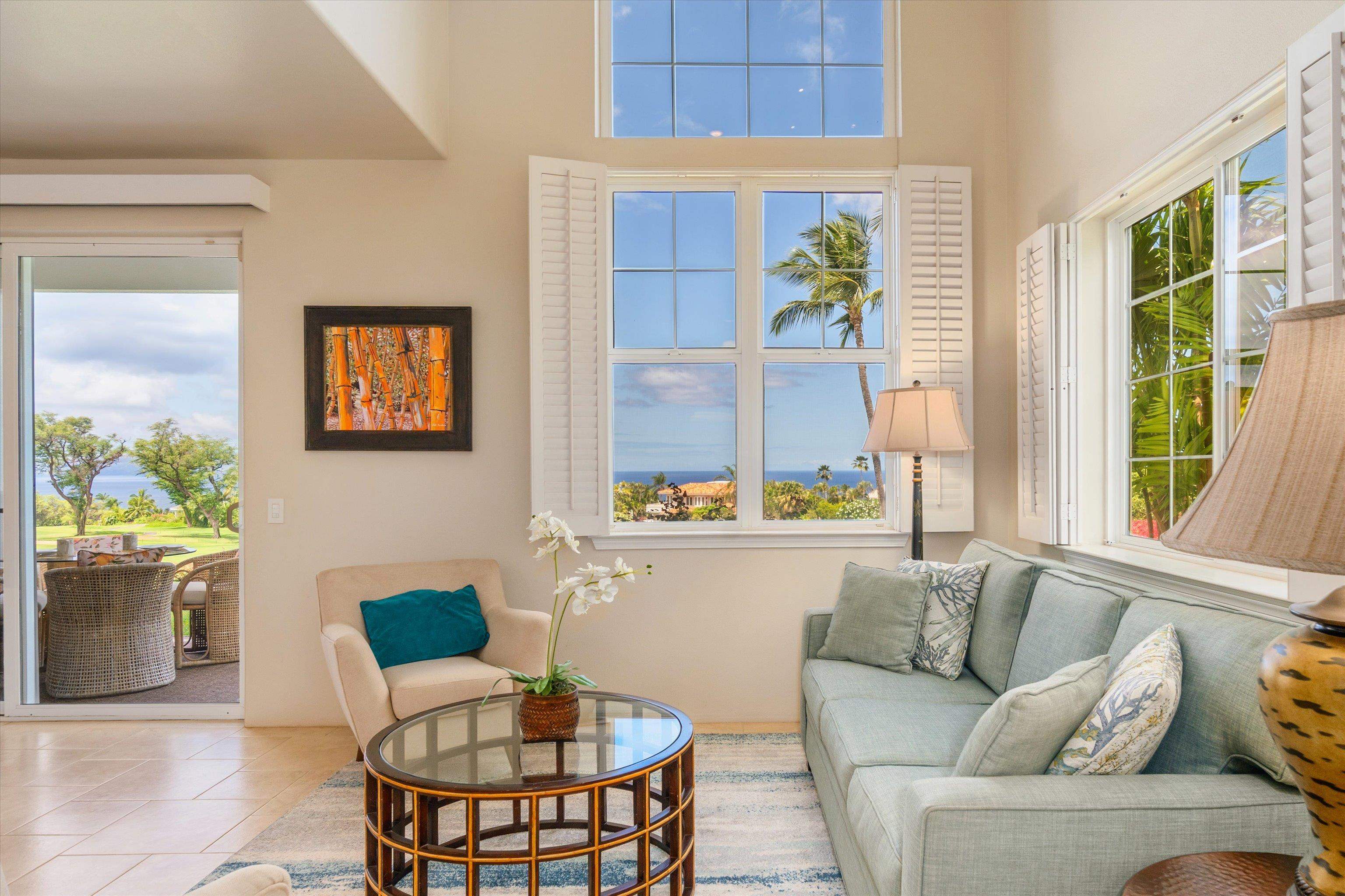 3950 Kalai Waa Street, Unit R 103 Kihei, HI 96753 - Photo 29 of 50 a living room with furniture and a window