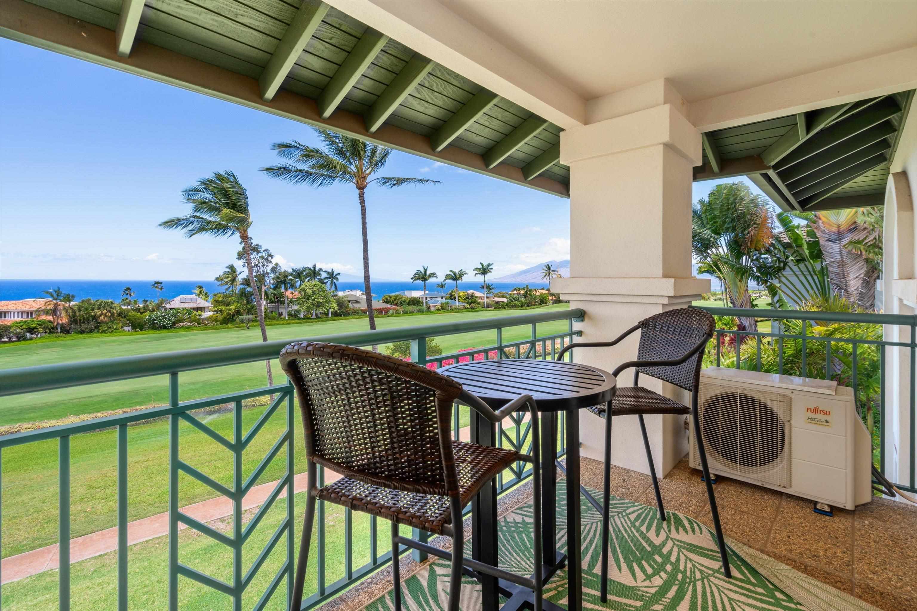 3950 Kalai Waa Street, Unit R 103 Kihei, HI 96753 - Photo 33 of 50 a patio with an outdoor seating space
