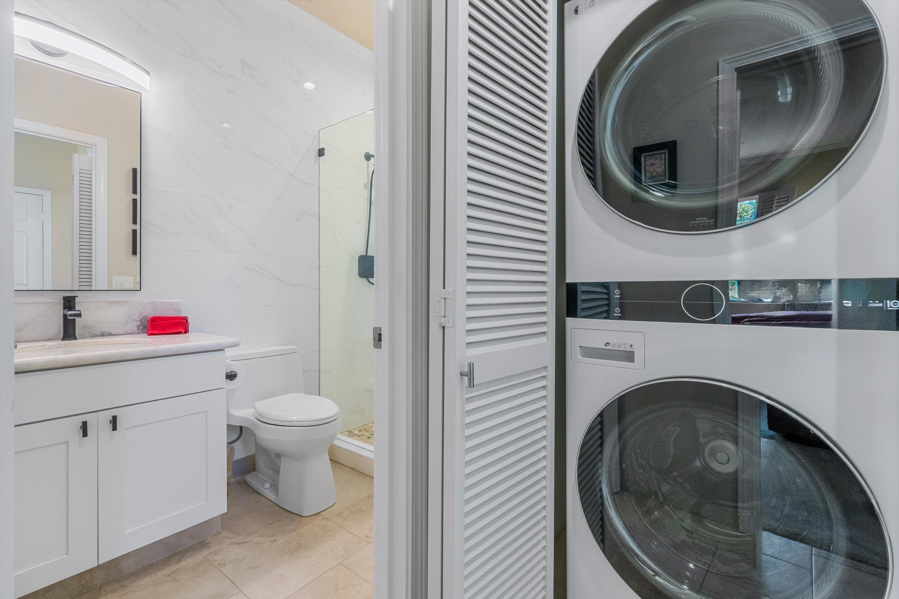 3950 Kalai Waa Street, Unit R 103 Kihei, HI 96753 - Photo 37 of 50 a bathroom with a toilet and a sink