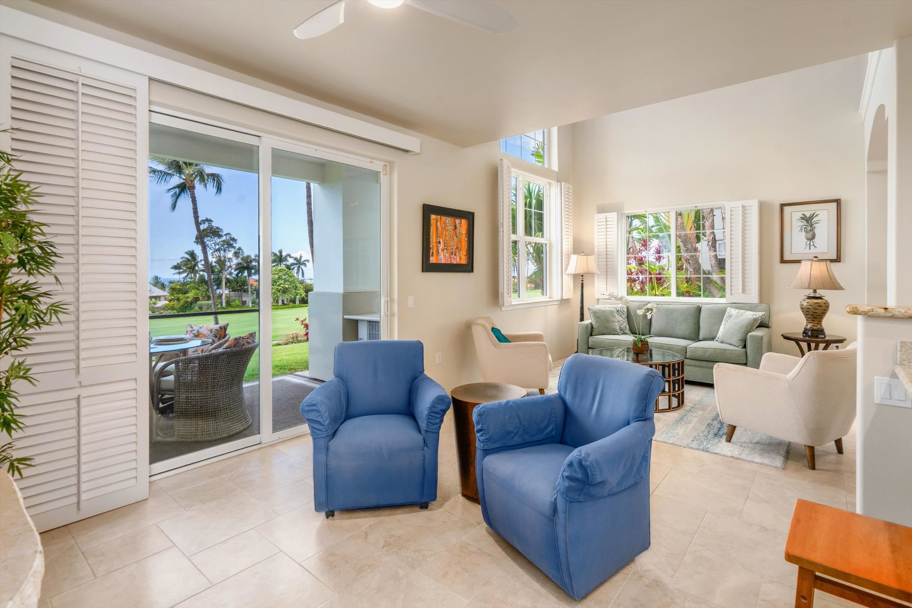 3950 Kalai Waa Street, Unit R 103 Kihei, HI 96753 - Photo 41 of 50 a living room with furniture and a window