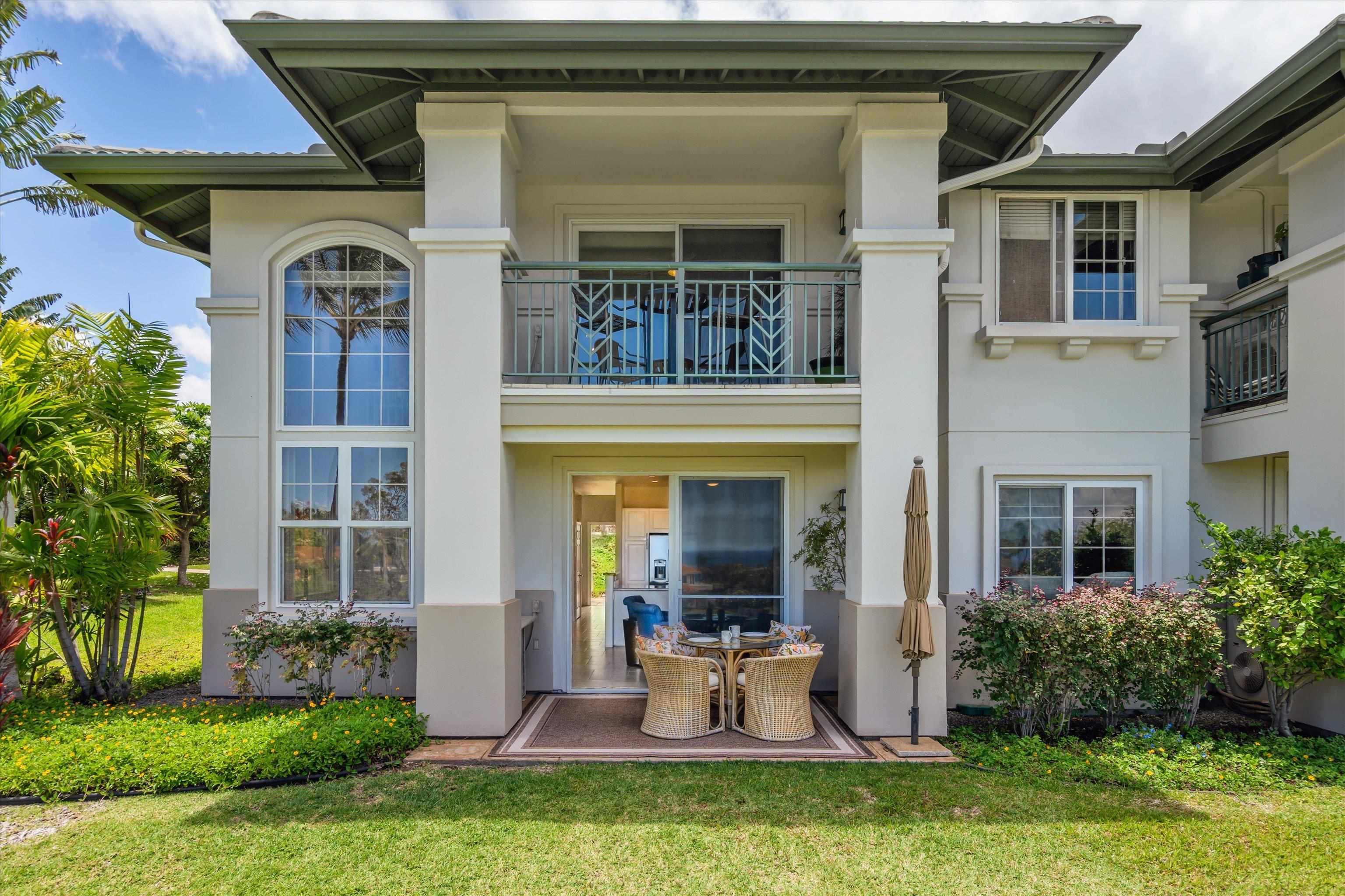 3950 Kalai Waa Street, Unit R 103 Kihei, HI 96753 - Photo 8 of 50 a front view of a house with garden