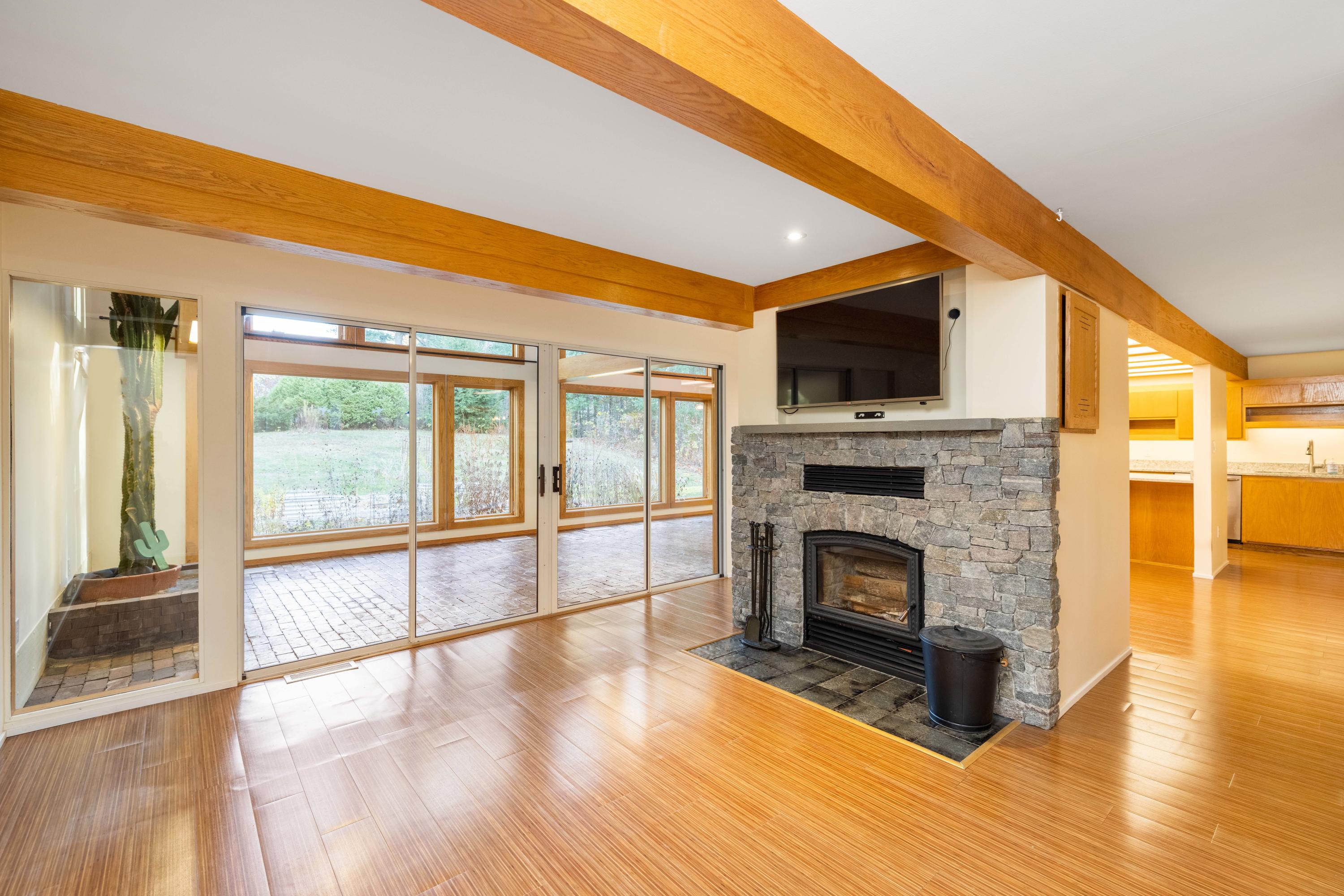 16 Sylvan Road Scarborough, ME 04074 - Photo 13 of 42 A cozy wood stove insert with fan