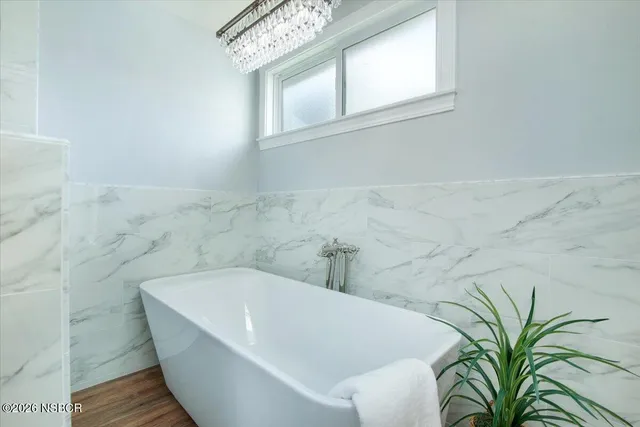 a bathroom with a bathtub