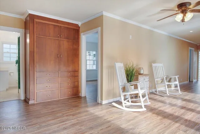 a bathroom with a sink and a window